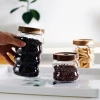Creative coarse grain glass storage jar, hammer-patterned acacia wood lid sealed jar, coffee bean storage jar and storage bottle Item Picture